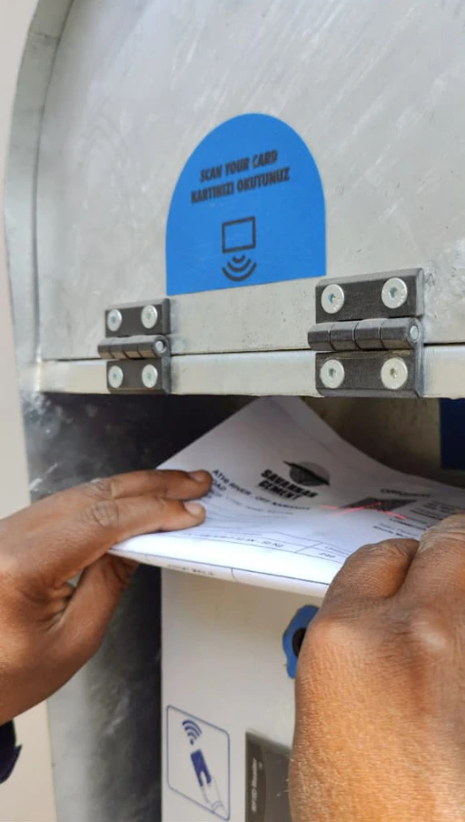 Driver self-service kiosk used to process weighing transactions. Driver self-service kiosk terminal at automated weighbridge, Kenya