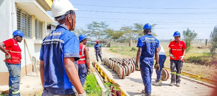 Scalestech engineers calibrating the upgraded ESIT SCD digital load cells. Technicians calibrating digital load cells on Savannah Cement weighbridge, Kenya