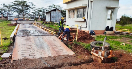 Foundation and conduit work ahead of automation accessory installation. Civil works and foundation preparation for weighbridge automation, Kenya