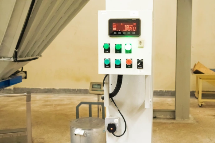 Automated measurement system for monitoring grain levels and weight in storage silos.