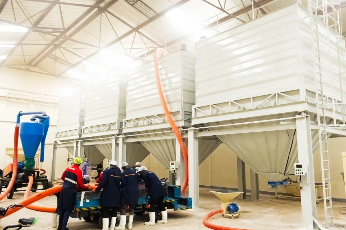 Heavy-duty weighing tank system for grain storage and processing facilities.