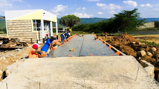 weighbridge deck aligned over its foundation in Mai Mahiu, Kenya Precision alignment of the weighbridge deck