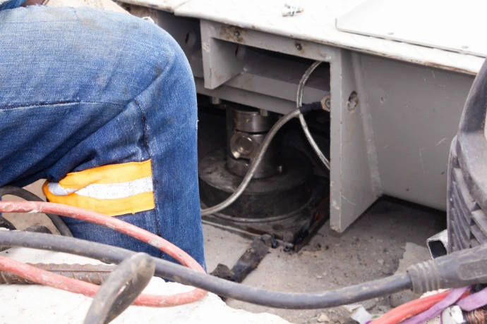 High-precision load cells fitted beneath the weighbridge deck during installation in Nairobi